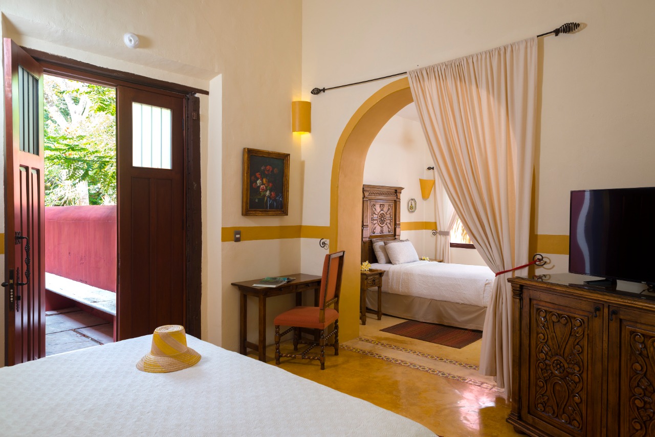 habitación junior suite, 1 cama king size y 1 individual