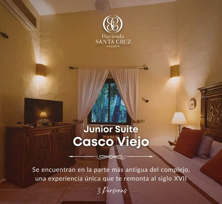 habitación junior suite, 1 cama king size y 1 individual