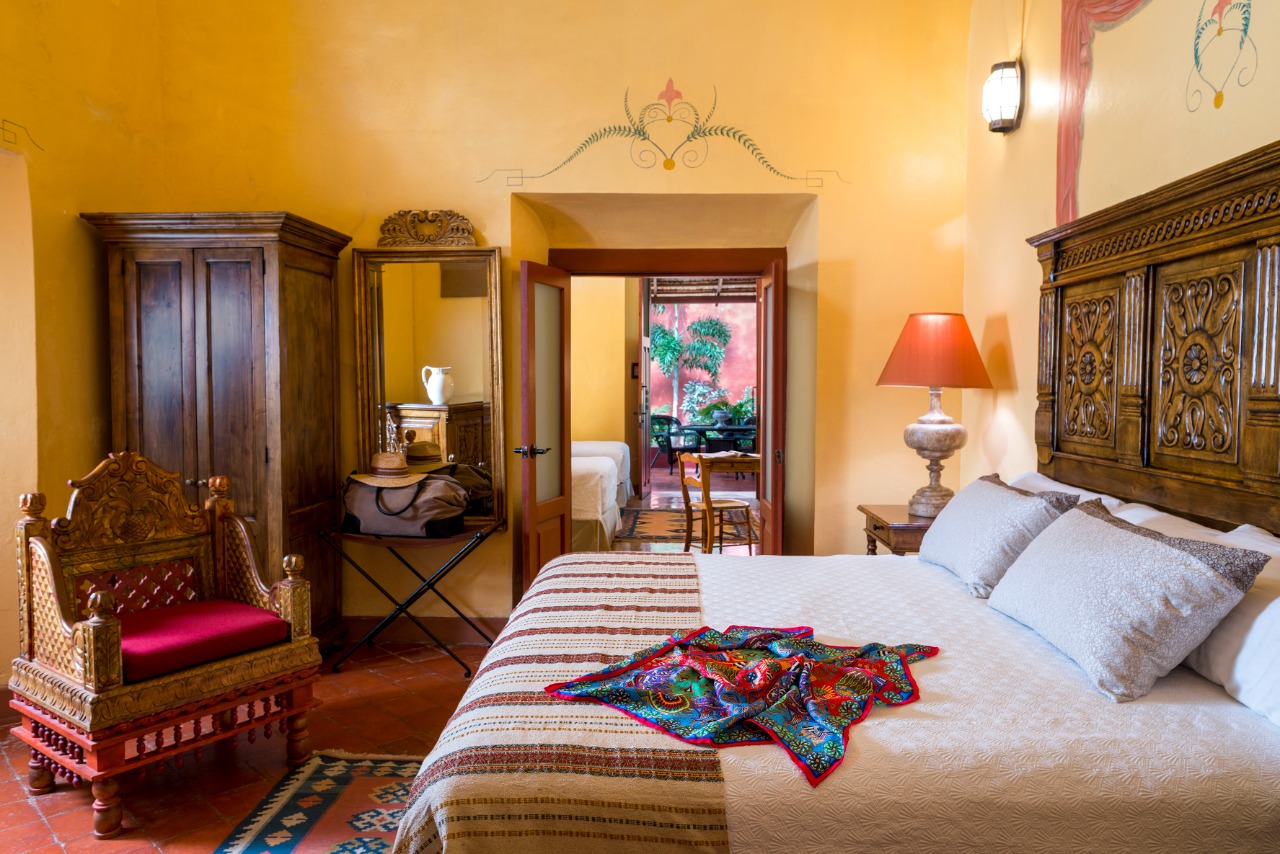 habitación master suite, 1 cama king size y 2 camas individuales