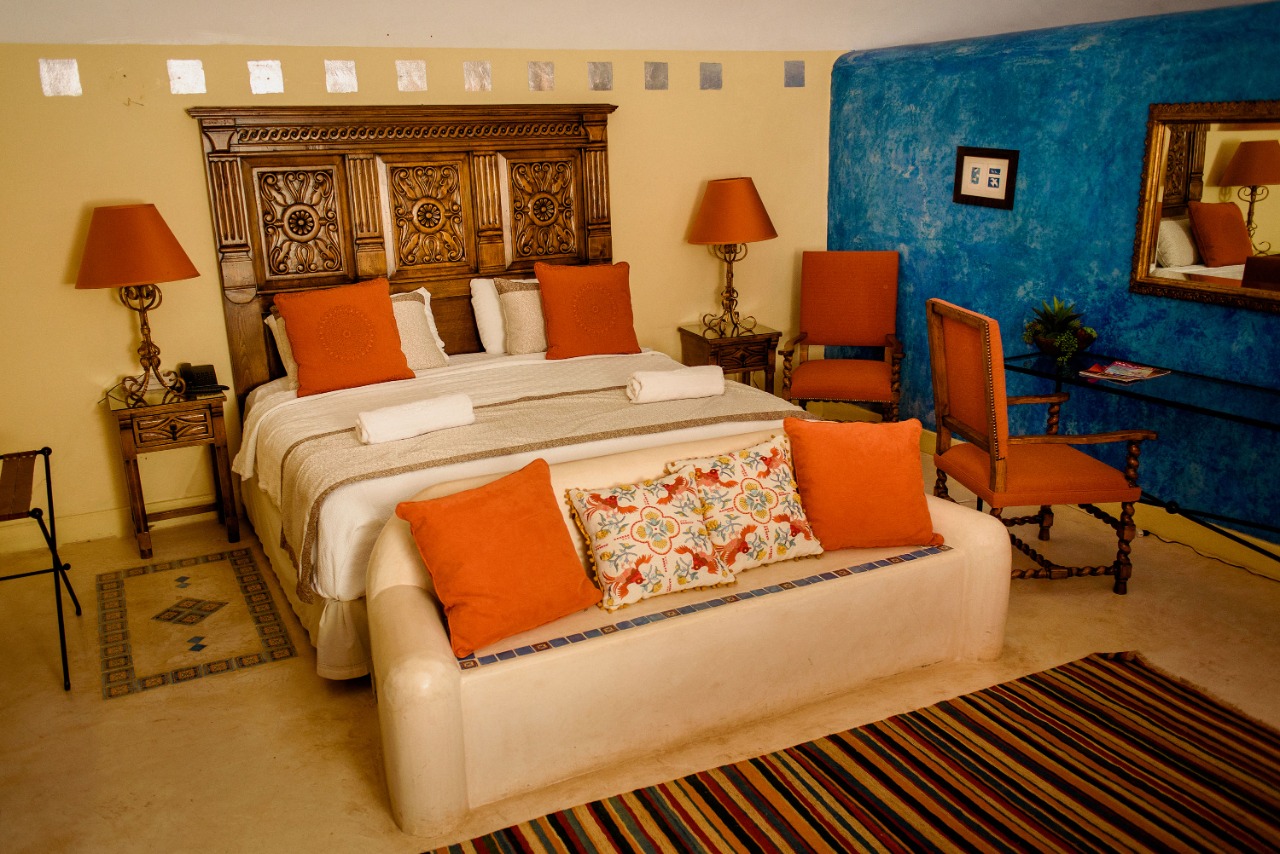 habitación master suite, 1 cama king size y 2 camas individuales